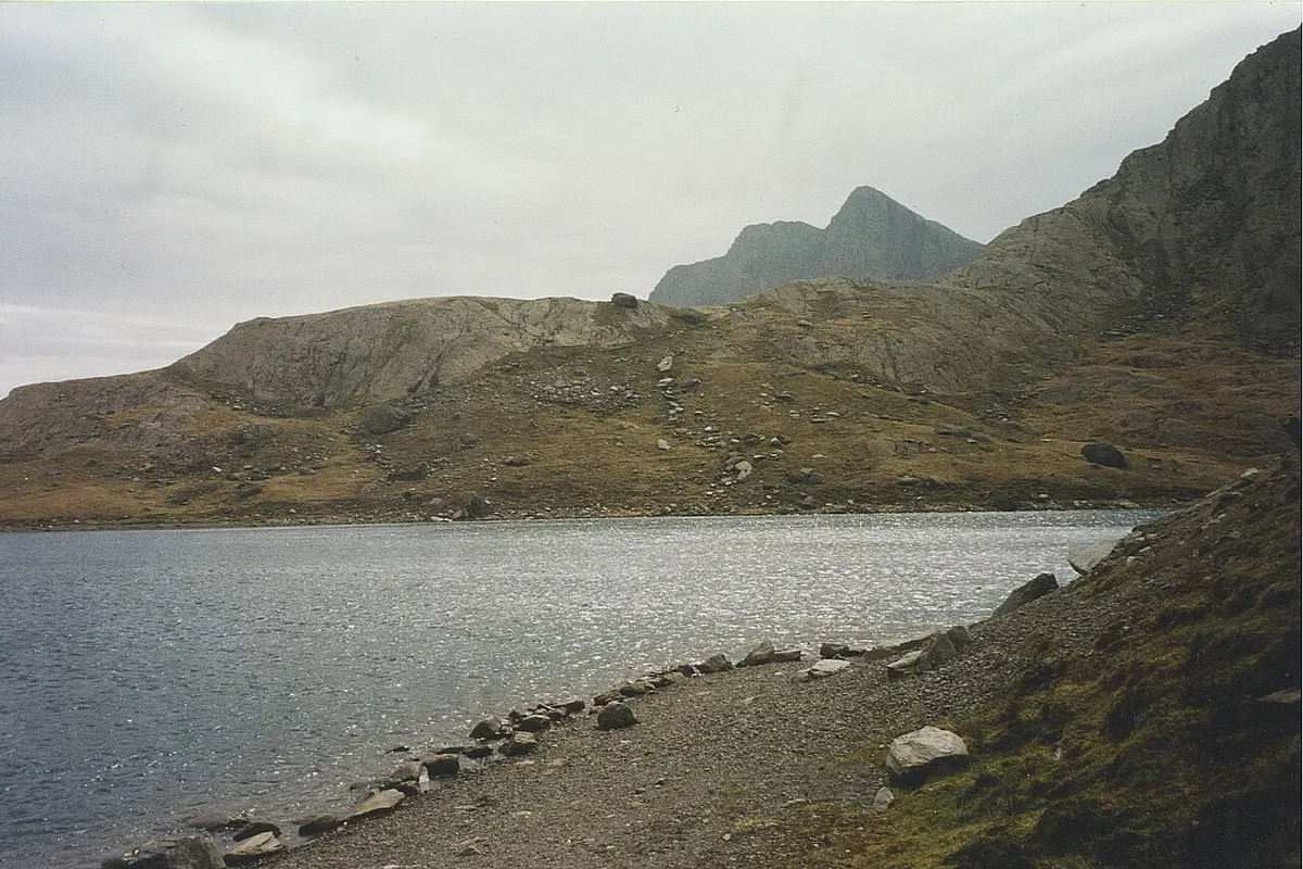 Glaslyn, a deep blue mountain lake beneath the summit of Snowdon, where the afanc is said to have been banished.