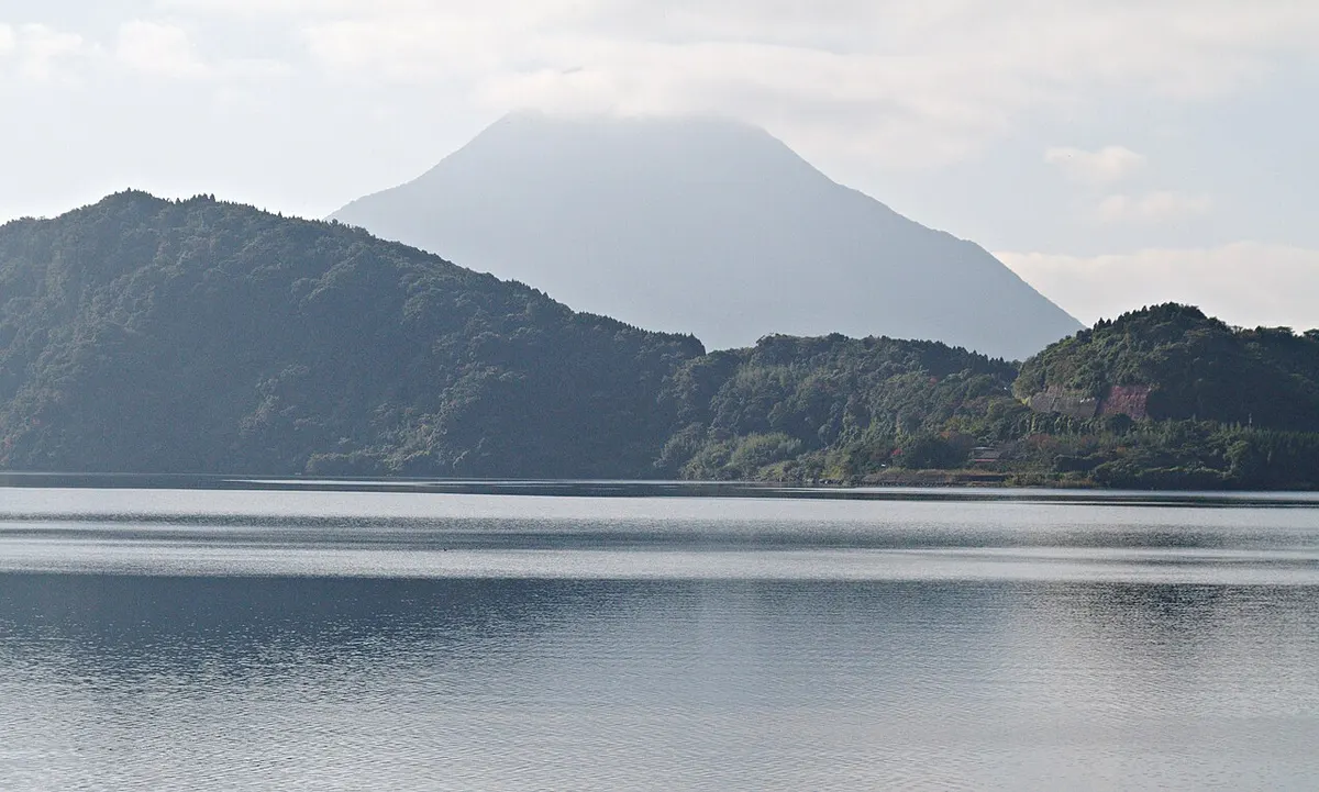 Lake Ikeda with the cone of Mount Kaimon rising behind it