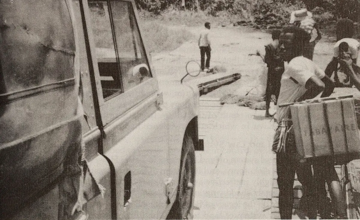 A car ferry crossing the broad Kasai River in the Democratic Republic of the Congo