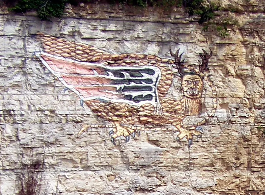 The modern painting of the Piasa Bird on the limestone bluffs above the Mississippi River at Alton, Illinois