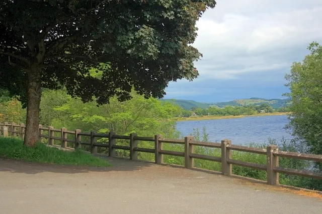 Llyn Tegid, or Bala Lake, surrounded by green hills in North Wales.