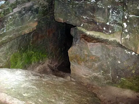 The rocky entrance to Devil’s Den cave in Devil’s Den State Park, Arkansas